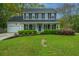 Traditional two-story home with attached garage and lush green lawn at 218 Candleberry Cir, Goose Creek, SC 29445