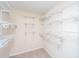 A large walk-in closet features multiple shelves for storage at 218 Candleberry Cir, Goose Creek, SC 29445