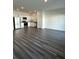 A spacious kitchen with stainless steel appliances and wood-look flooring at 2405 Scarlett Maple St, Summerville, SC 29486