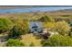 Stunning aerial view of the estate showcasing its sprawling grounds, river access, and serene, tree-lined surroundings at 2410 Kemway Rd, Johns Island, SC 29455