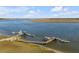 Breathtaking aerial view of waterfront docks featuring multiple slips and boat lifts on the marsh at 2410 Kemway Rd, Johns Island, SC 29455