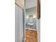 Cozy bathroom featuring a vintage-style pedestal sink, neutral decor, and natural light at 2410 Kemway Rd, Johns Island, SC 29455