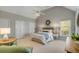 Spacious bedroom featuring vaulted ceiling, neutral walls, ceiling fan, two closets and recessed lighting at 2410 Kemway Rd, Johns Island, SC 29455