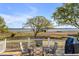 Outdoor deck area with patio furniture and beautiful waterfront view at 2410 Kemway Rd, Johns Island, SC 29455