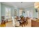 Dining room with wood table, area rug and view of the front door at 2410 Kemway Rd, Johns Island, SC 29455