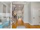 Bright foyer features hardwood floors, staircase, and access to other rooms in the home at 2410 Kemway Rd, Johns Island, SC 29455