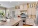 Modern kitchen featuring granite countertops, stainless steel appliances, and custom cabinetry at 2410 Kemway Rd, Johns Island, SC 29455