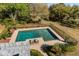 Aerial view of the pool with an outdoor seating area and well-maintained landscaping at 2410 Kemway Rd, Johns Island, SC 29455
