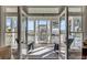 View from inside to the porch with chairs and outdoor views at 2410 Kemway Rd, Johns Island, SC 29455