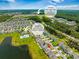 Aerial shot highlighting community amenities including a pool, proximity to shops, and restaurants at 260 Dunlin Dr, Summerville, SC 29486