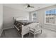 Inviting bedroom with a large bed, soft carpet, and plenty of natural light from the windows at 260 Dunlin Dr, Summerville, SC 29486