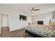 Comfortable bedroom with wood-look flooring, neutral walls, and a ceiling fan for added convenience at 260 Dunlin Dr, Summerville, SC 29486