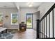 Welcoming entryway with wood floors, staircase, and a view of the outdoors at 260 Dunlin Dr, Summerville, SC 29486