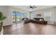 Inviting living room with wood floors, comfortable seating, and sliding glass doors leading to an outdoor area at 260 Dunlin Dr, Summerville, SC 29486