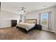 Spacious main bedroom featuring wood floors, neutral walls, and a ceiling fan for a serene atmosphere at 260 Dunlin Dr, Summerville, SC 29486