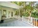 Spacious porch offers a beautiful view of the surrounding foliage at 2737 Old Forest Dr, Seabrook Island, SC 29455