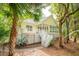 Beautiful home exterior featuring a spacious deck, verdant trees, and inviting backyard at 2737 Old Forest Dr, Seabrook Island, SC 29455