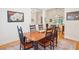 Bright dining room with seating for six, and hardwood floors at 2737 Old Forest Dr, Seabrook Island, SC 29455
