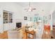 Comfortable living room with hardwood floors, fireplace, and built-in shelving providing ample storage at 2737 Old Forest Dr, Seabrook Island, SC 29455
