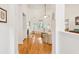 Bright living room with hardwood floors, high ceilings, and an abundance of natural light at 2737 Old Forest Dr, Seabrook Island, SC 29455