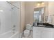 Clean bathroom features a shower and tub combo and classic vanity with modern sink at 278 Furman Farm Pl, Daniel Island, SC 29492