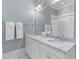Bathroom featuring double vanity, granite countertops, and white tile in the shower at 278 Furman Farm Pl, Daniel Island, SC 29492