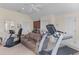 Finished home gym with hardwood floors, ample lighting, and modern exercise equipment at 278 Furman Farm Pl, Daniel Island, SC 29492