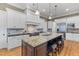 Beautiful kitchen with stainless steel appliances, granite countertops, and hardwood floors at 278 Furman Farm Pl, Daniel Island, SC 29492