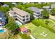 Expansive waterfront property featuring a pool, gazebo, and lush lawn at 2906 Palm Blvd, Isle of Palms, SC 29451
