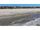 Beautiful beachfront view of homes along a sandy shoreline at 2906 Palm Blvd, Isle of Palms, SC 29451