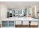 Spacious kitchen featuring a center island, stainless appliances, and breakfast bar at 2906 Palm Blvd, Isle of Palms, SC 29451