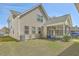 Beautiful backyard with a screened-in porch and a well-maintained lawn, ideal for outdoor activities at 3073 Moonlight Dr, Charleston, SC 29414