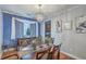 Elegant dining room featuring a modern chandelier, stylish decor, and ample natural light at 3073 Moonlight Dr, Charleston, SC 29414