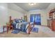 Beautiful primary bedroom with traditional wood furniture, soft carpet, and an inviting atmosphere at 3073 Moonlight Dr, Charleston, SC 29414
