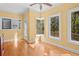 Cozy breakfast area with large windows providing views of the backyard and surrounding landscape at 3180 Pine Needle Ln, Seabrook Island, SC 29455