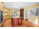 Spacious kitchen boasting a center island, custom cabinetry, stainless steel appliances, and an adjacent breakfast area at 3180 Pine Needle Ln, Seabrook Island, SC 29455