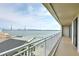 Balcony with a beautiful water view of bridge, boats, and docks at 330 Concord St # 7E, Charleston, SC 29401