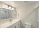 Well-lit bathroom with a vanity, shower, and modern fixtures at 330 Concord St # 7E, Charleston, SC 29401