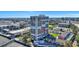 Exterior view of a high-rise building with city views and surrounding greenery at 330 Concord St # 7E, Charleston, SC 29401