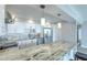 Spacious kitchen with stainless steel appliances, stone countertops, and plenty of counter space at 330 Concord St # 7E, Charleston, SC 29401