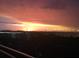 Beautiful sunset view over the city's skyline, casting vibrant colors across the sky at 330 Concord St # 7E, Charleston, SC 29401