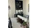 Dining room features modern decor and a candle centerpiece on the table at 330 Concord St # 9C, Charleston, SC 29401