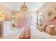 Charming bedroom features cozy decor, soft lighting, and a comfortable bed at 355 Claret Cup Way, Charleston, SC 29414