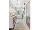 Elegant entryway featuring stylish lighting fixtures, a decorative console table, and a view into the bright, welcoming home at 355 Claret Cup Way, Charleston, SC 29414