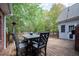 Relaxing back deck with wooden table and chairs, ideal for outdoor dining and entertaining at 3708 Colonel Vanderhorst Cir, Mount Pleasant, SC 29466