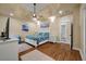 Serene bedroom with tray ceiling, hardwood floors, and a spa-like bathroom at 3708 Colonel Vanderhorst Cir, Mount Pleasant, SC 29466