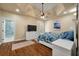 Primary bedroom with a trey ceiling, hardwood floors, ensuite bathroom, and exterior access at 3708 Colonel Vanderhorst Cir, Mount Pleasant, SC 29466