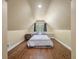 Cozy bedroom features hardwood floors, recessed lighting, and a window with seating and curtains at 3708 Colonel Vanderhorst Cir, Mount Pleasant, SC 29466