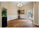 Bright entryway showcases high ceilings, hardwood floors, and elegant chandelier lighting at 3708 Colonel Vanderhorst Cir, Mount Pleasant, SC 29466