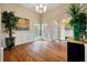 Inviting entryway features hardwood floors, wainscoting, and plenty of natural light at 3708 Colonel Vanderhorst Cir, Mount Pleasant, SC 29466